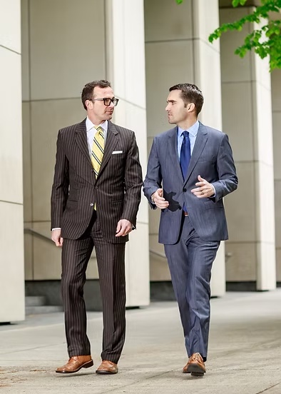 Michael De Muniz and Steven Sherlag outside the courthouse